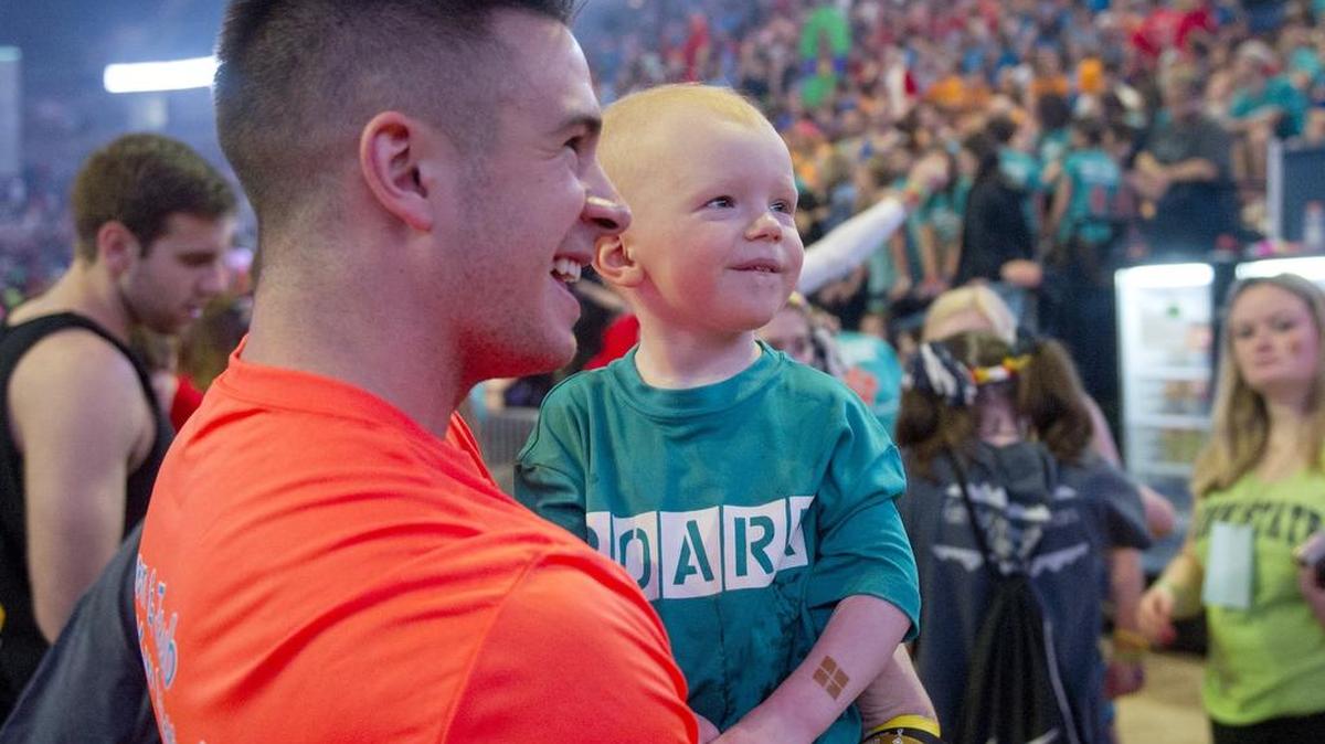 Nolan Cavanaugh laughs with Owen Bonn during the Penn State IFC/Panhellenic Dance Marathon on Sunday, February 21, 2016 in the Bryce Jordan Center. The 46 hour dance marathon raises money for the Four Diamonds Fund to help families battling pediatric cancer.
