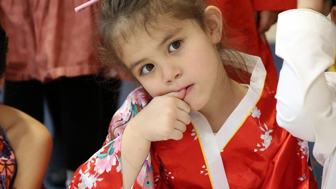 Myka Tamashine hangs out during the annual celebration of the Chinese New Year on Friday at Young Scholars of Central Pennsylvania Charter School.