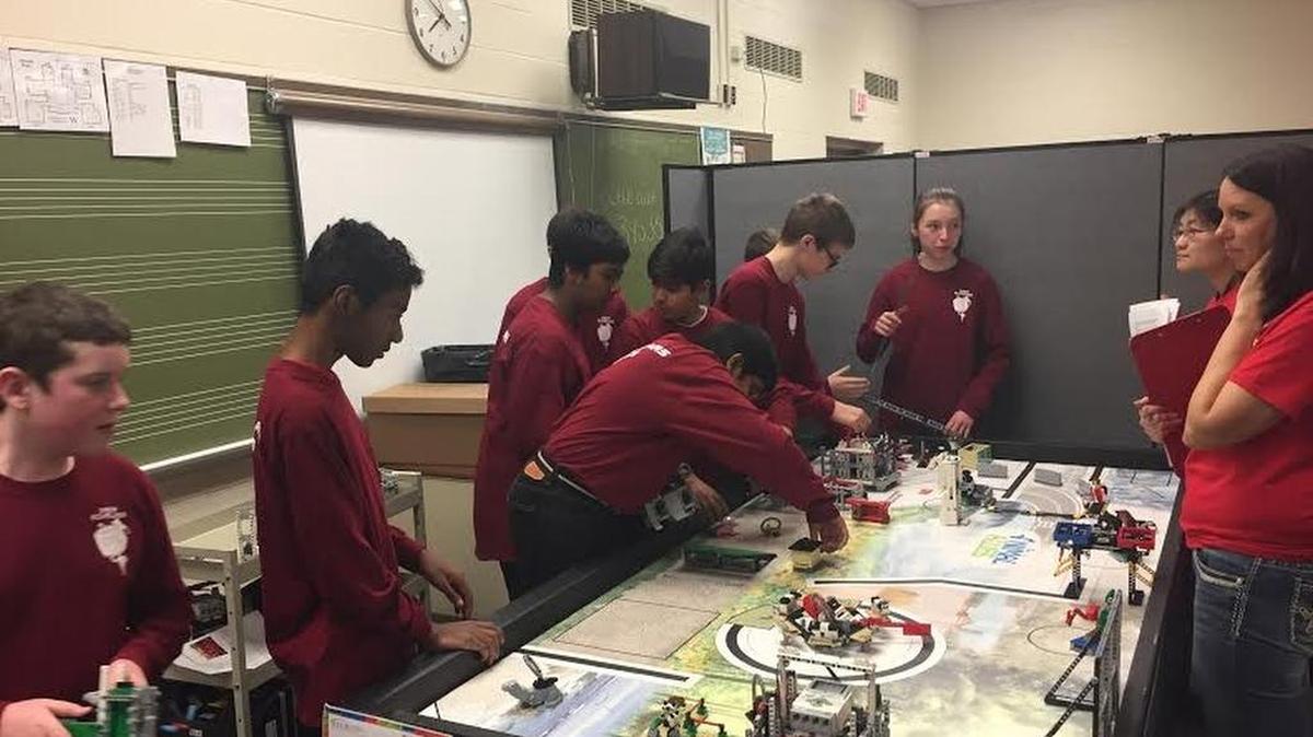 Young Scholars of Central Pennsylvania Charter School middle school students work on their robotics project for the international First Robotics Competition, to be held in April.