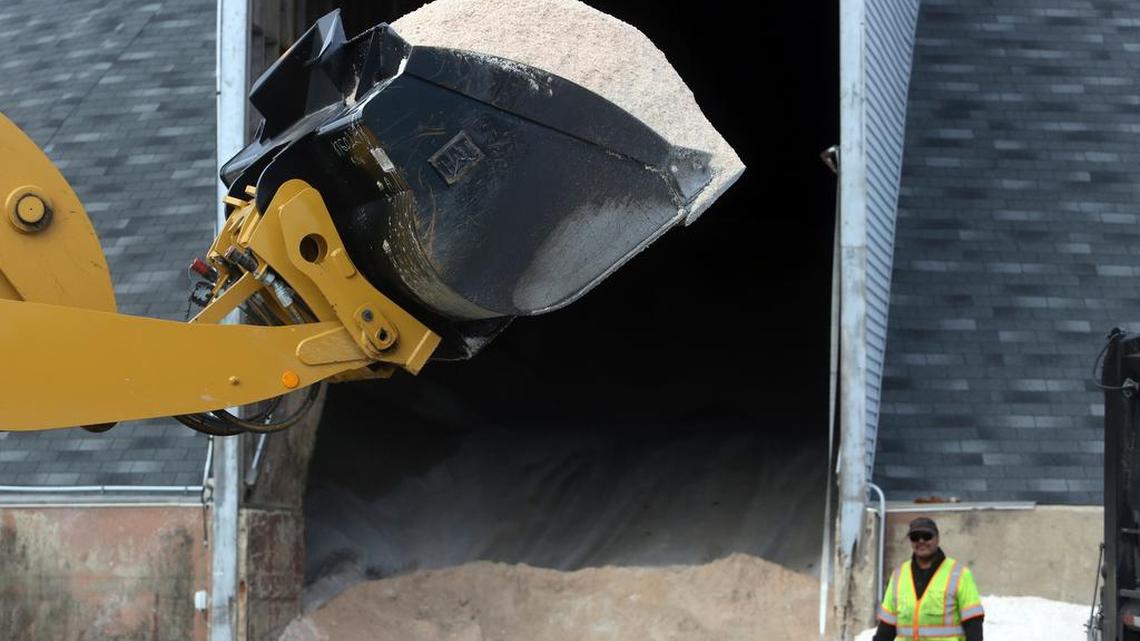Streets Department crews load rock salt in preparation for an expected winter snowstorm in Philadelphia, Tuesday March 6, 2018. Philadelphia officials say all schools and municipal offices will be closed Wednesday due to a snowstorm expected to dump inches of heavy, wet snow on the city late Tuesday into Wednesday.