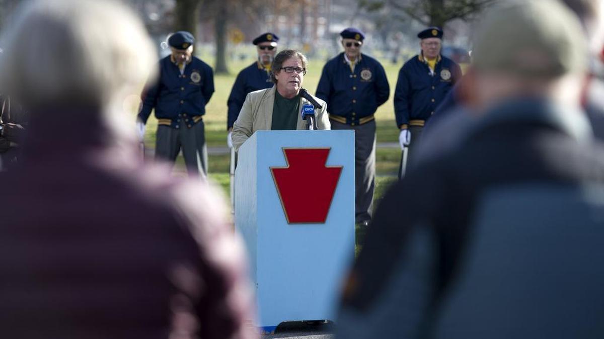 Retired U.S. Navy Capt. Jim Bloom gives an address during a ceremony Monday commemorating the 74th anniversary of the Pearl Harbor attacks.