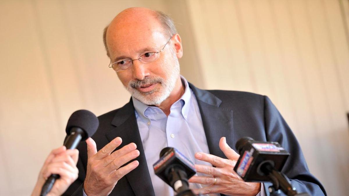 Gov. Tom Wolf talks with reporters during a press conference in Bellefonte on Monday, Nov. 2, 2015.