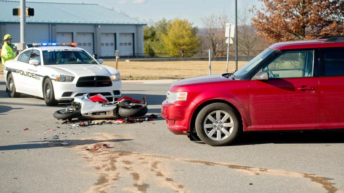 Traffic was backed up at the intersection of North Atherton Street and Colonnade Boulevard after a vehicle and motorcycle crash on Saturday.