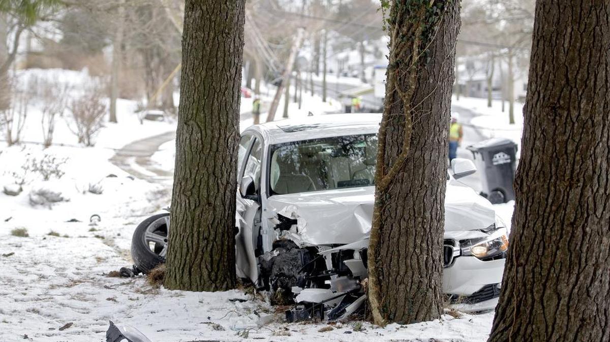 A one vehicle accident caused downed power lines on University Drive on Thursday, February 11, 2016. The vehicle hit the pole before crashing into a tree. West Penn power was on scene to replace the pole with the downed power lines which could take several hours.