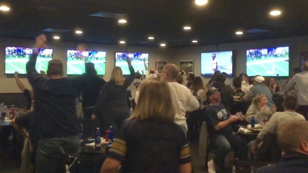 Penn State football fans watch the Big Ten Championship game Saturday at Lettermans Sports Grill.