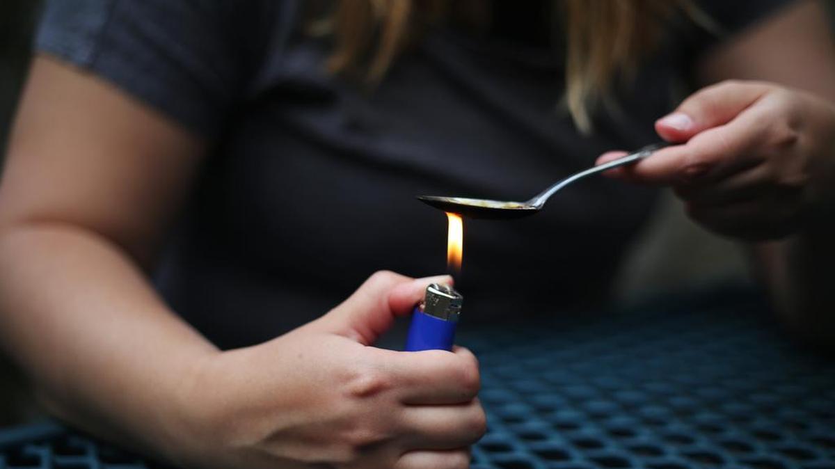 A photo illustration of heroin use.