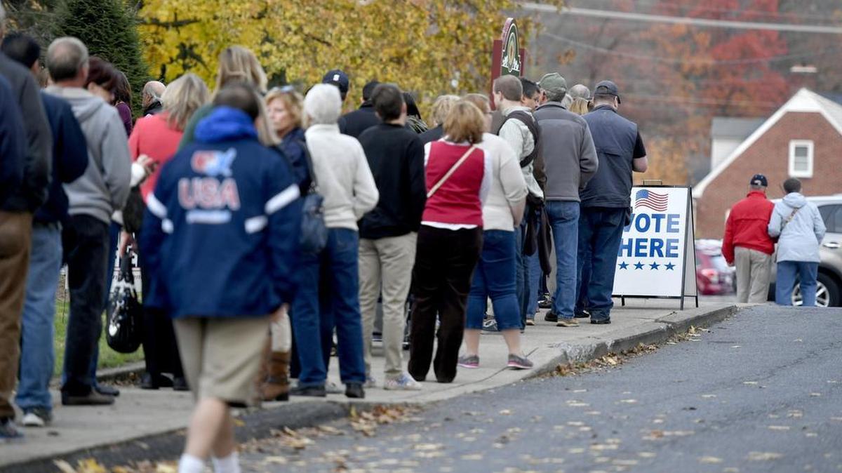 Hundreds of voters in Harris Township line up outside of Zion Lutheran Church to vote on Tuesday.