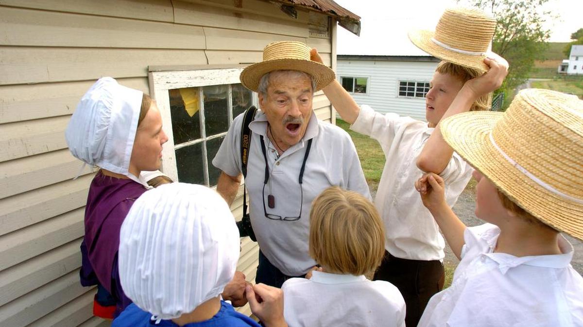 Bill is usually is the instigator while playing with Amish children but sometimes they give it right back to him. Bill Coleman has been photographing the Amish for over 30 years.