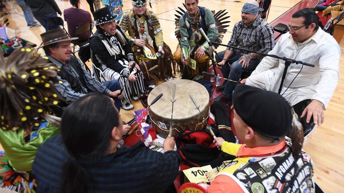Members of the Chaska Hotain group perform during “New Faces of an Ancient People Traditional American Indian Powwow” on Sunday at Mount Nittany Middle School.
