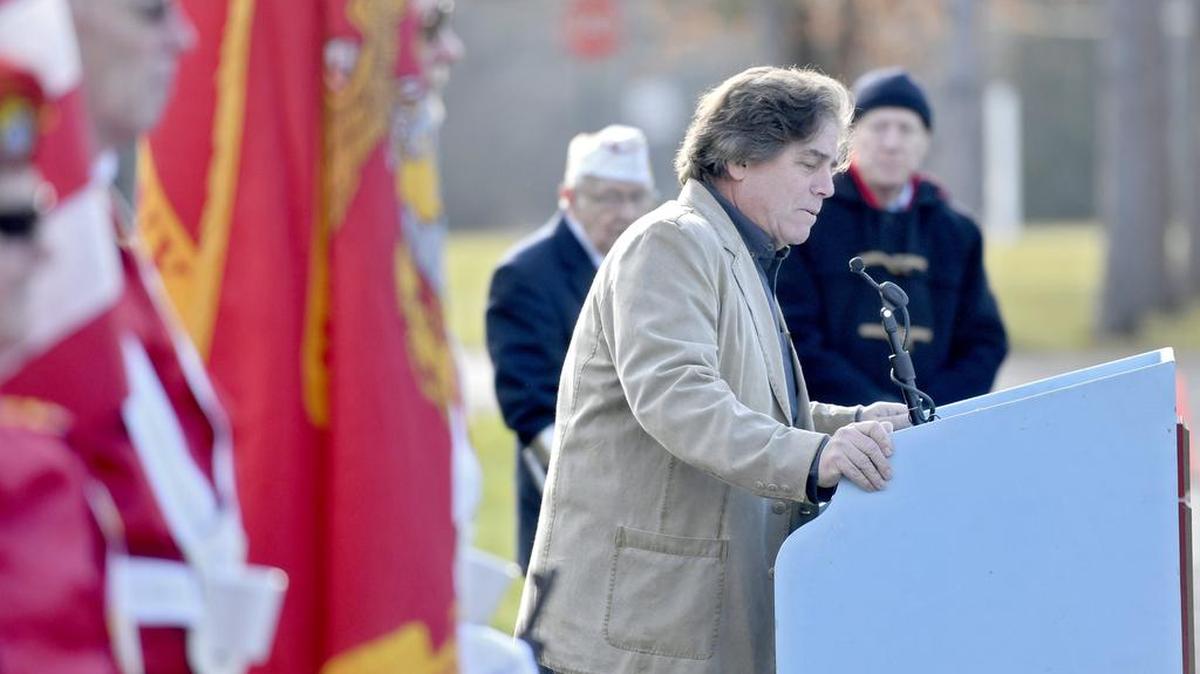 Retired Navy Capt. James Bloom speaks Wednesday during the Pearl Harbor Remembrance Day Tribute at the Pennsylvania Military Museum in Boalsburg