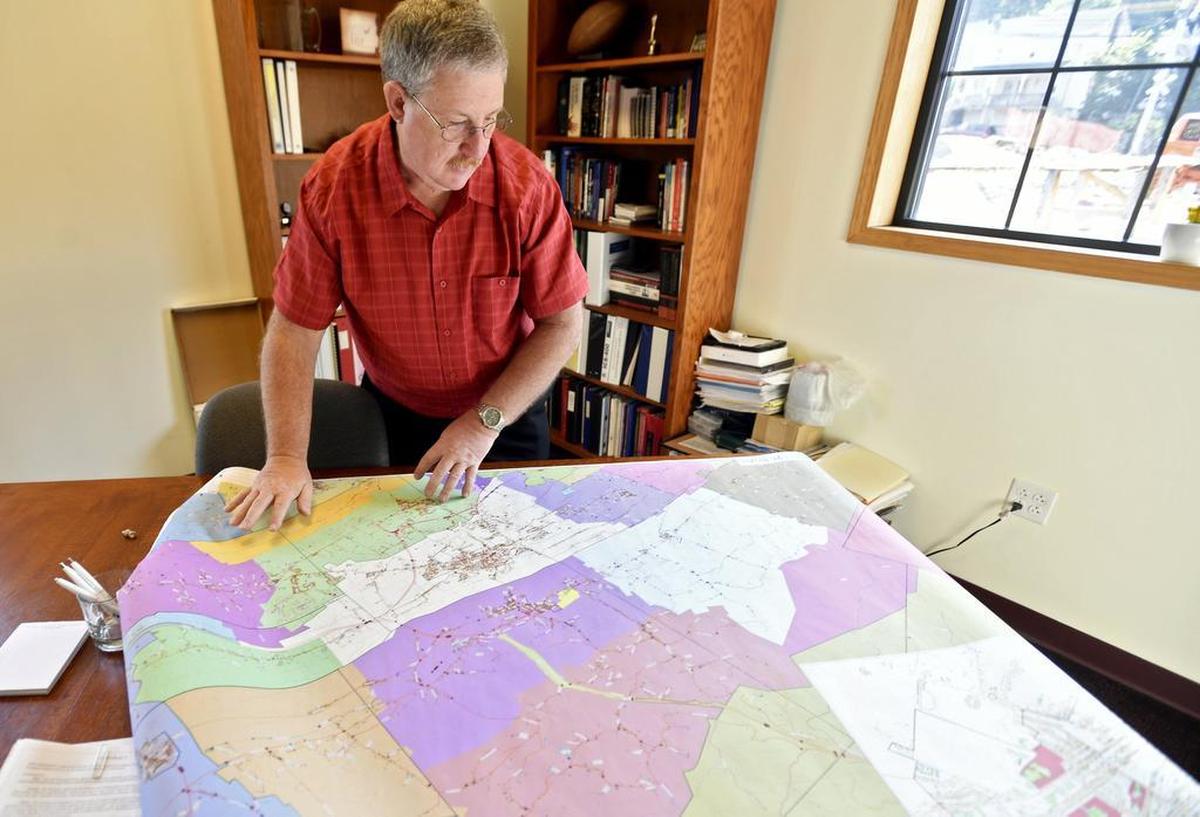 Bellefonte ambulance Chief Scott Rhoat shows a map of the station’s coverage area in August 2017.