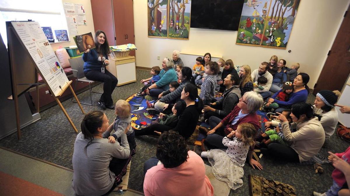 Children’s librarian Paula Bannon reads a story to children in January 2016 at Schlow Centre Region Library. The library is gearing up for its annual Write and Illustrate Your Own Book Contest for children in grades 1 through 6.