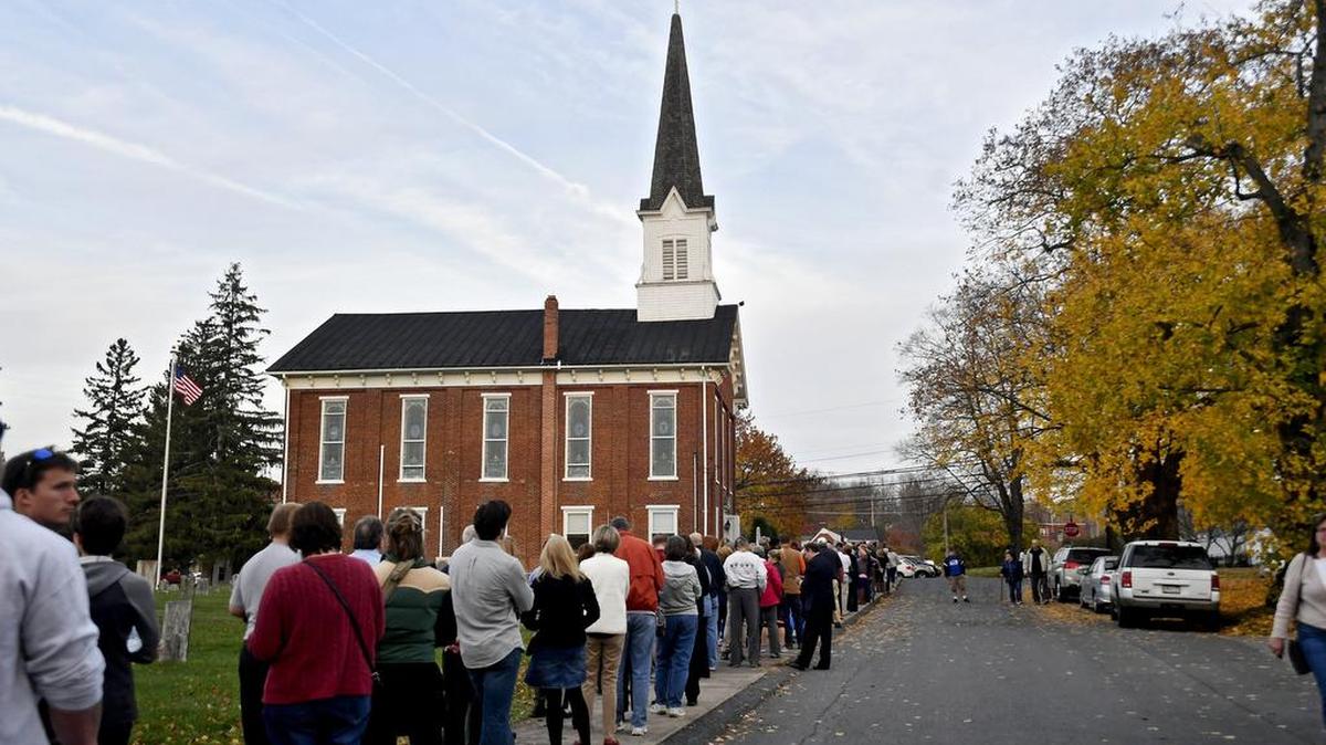 Hundreds of Harris Township voters line up outside of Zion Lutheran Church to vote in the 2016 presidential election. The 56th Precinct is seeing a higher-than-expected turnout for a primary election.