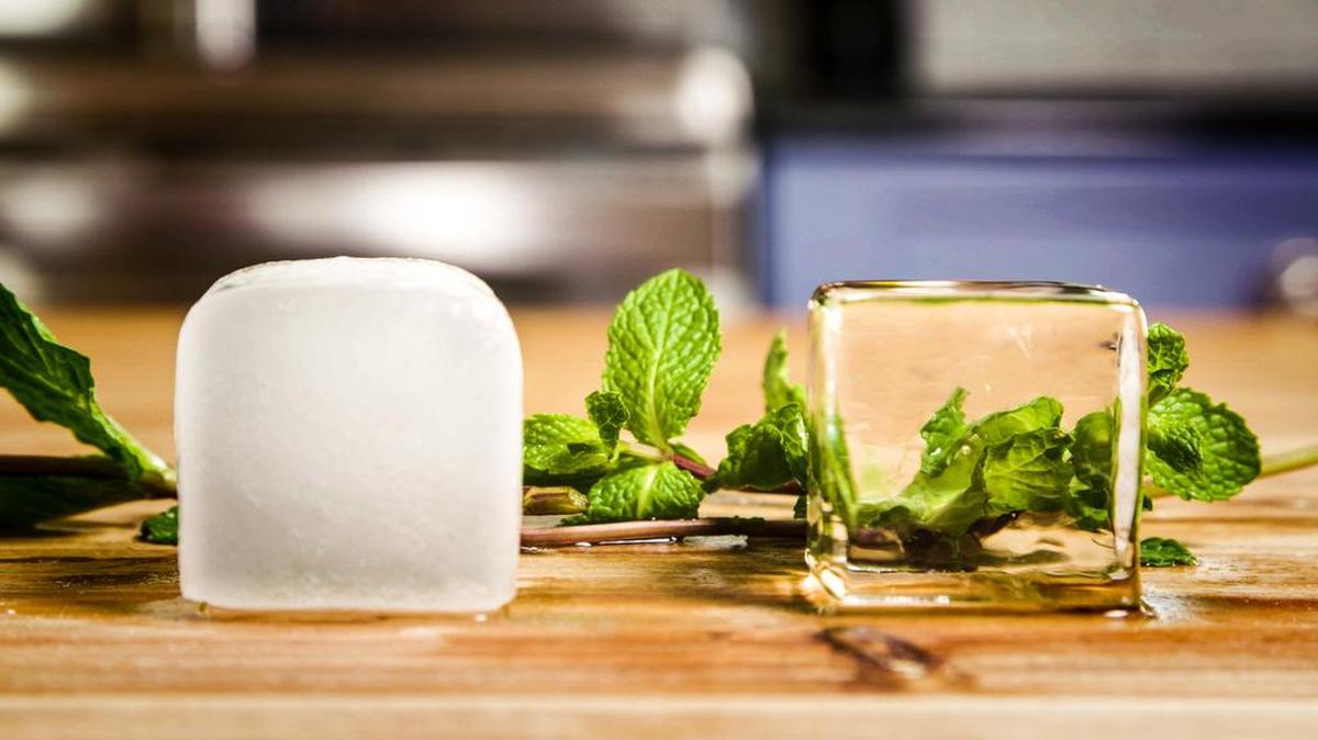 Ordinary ice is contrasted with cubes from an Ice Made Clear device.
