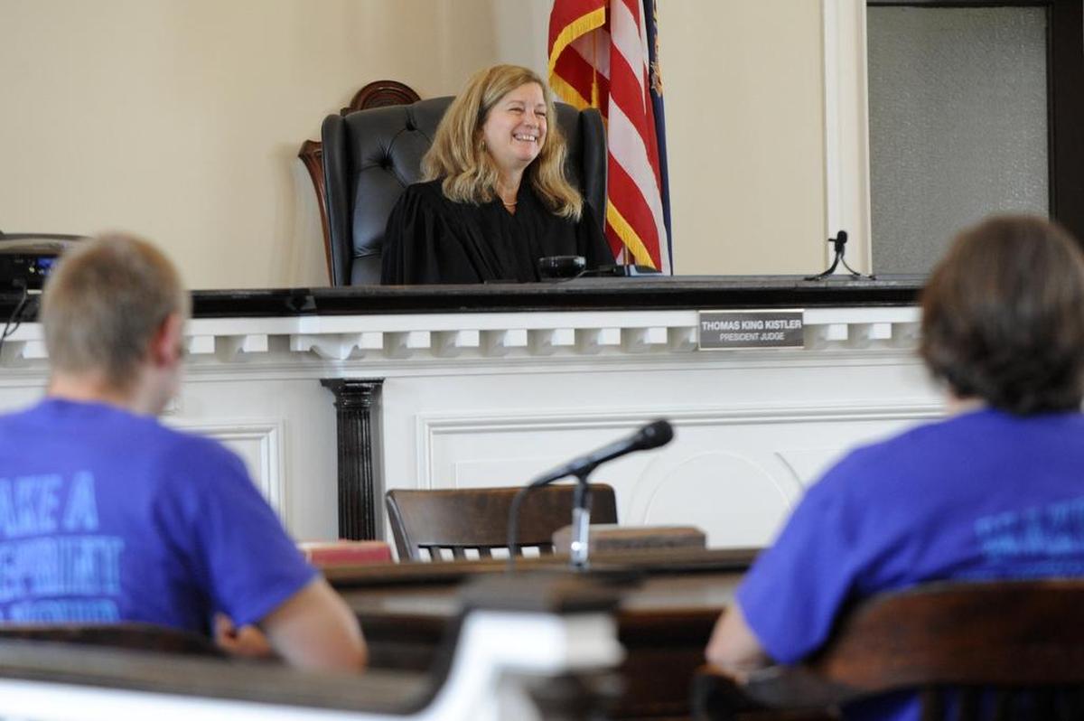 Students from the Blueprint program listen as Judge Pamela Ruest talks about her job at the Centre County Courthouse on July 21, 2015.
