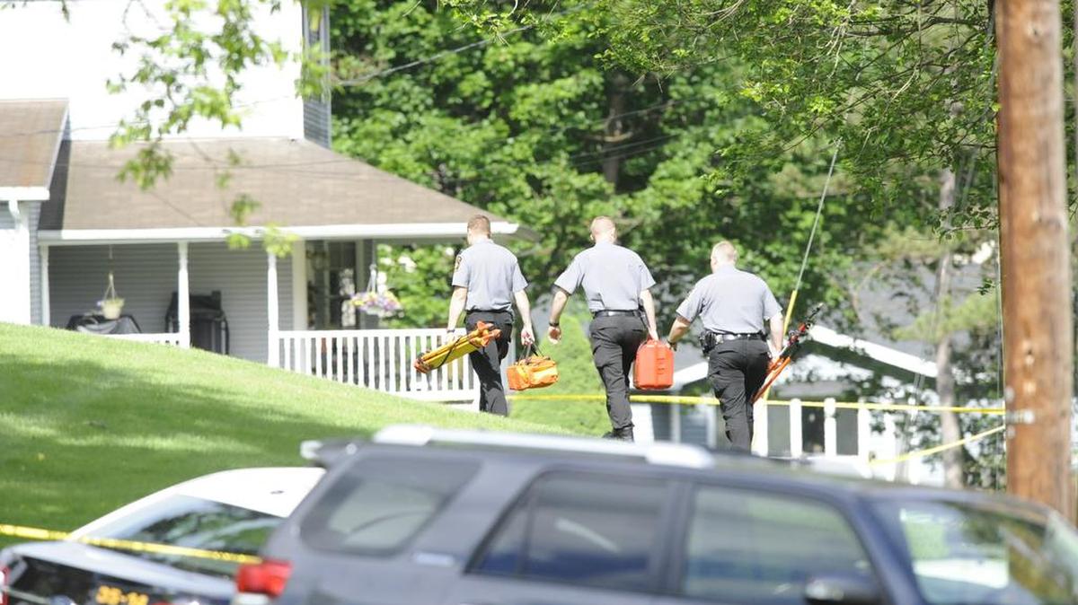 State police officers arrive on the scene of a homicide investigation on the 1000 block of Shady Lane Extension in Bellefonte on June 6.