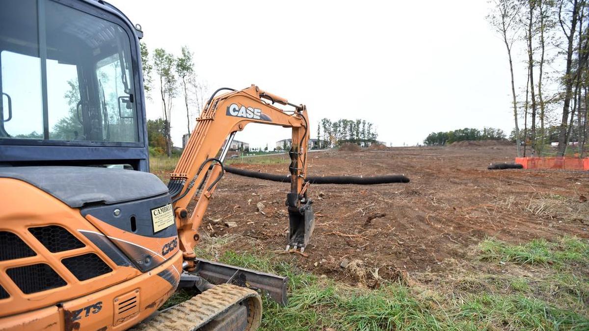 Work on at Patton Township housing development, The Station, at the intersection of Toftrees Avenue and Deans Way has stopped due to issues with a stormwater permit.