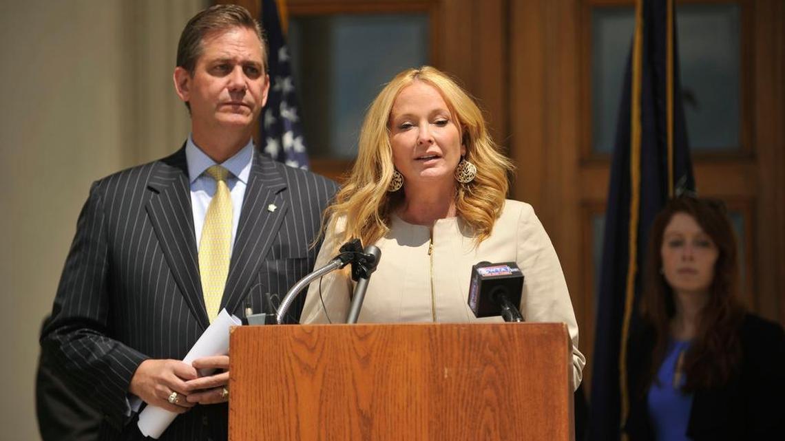 Flanked by her attorney Bruce Castor Jr. Stacy Parks Miller speaks during the press conference. Centre County District Attorney Stacy Parks Miller held a press conference Friday, July 31, 2015 in front of the Centre County Courthouse in Bellefonte, Pa. After months of investigation, testimony and secrecy, the state Office of the Attorney General released its findings of a grand jury investigation into forgery allegations against Centre County District Attorney Stacy Parks Miller. The office reported that the grand jury had found no evidence of wrongdoing and that Parks Miller would not face charges.
