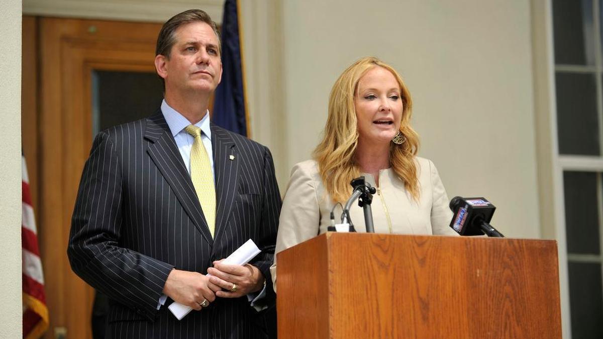 Flanked by her attorney Bruce Castor Jr., District Attorney Stacy Parks Miller addresses the press at the Centre County Courthouse in 2015 after the State Office of the Attorney General’s grand jury investigation found no evidence of wrongdoing and decided against charges in the forgery case brought against the DA by the county.