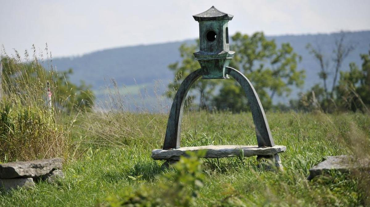 Roger Pollok’s bronze sculpture “Lantern” is part of the Rhoneymeade Aboretum and Sculpture Garden.