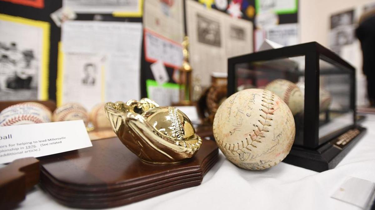 Twelve new members were elected into the Centre County Chapter of the Pennsylvania Sports Hall of Fame on Friday, and there will be a banquet in their honor Oct. 27. Seen here is a look at 2017 inductee Denny Leathers’ memorabilia at the Oct. 15, 2017, banquet at the State College Ramada.