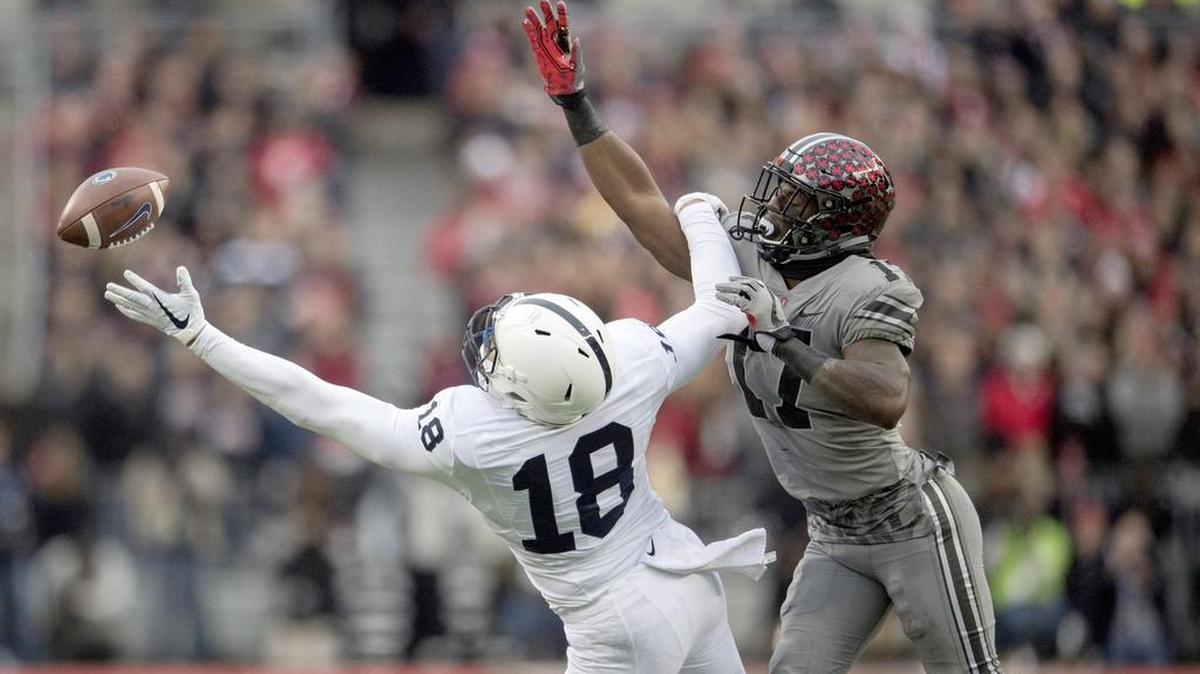 Ohio State linebacker Jerome Baker causes Penn State tight end Jonathan Holland to miss the catch during the game on Saturday, 28, 2017 at Ohio Stadium. Penn State lost, 39-38.