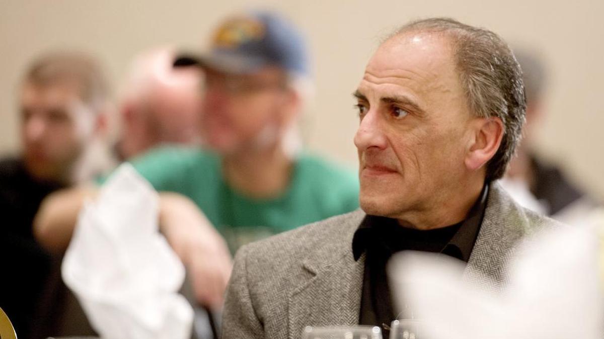 Carl Romanelli listens to Dr. Margaret Flowers during the Green Party of Pennsylvania 2016 annual meeting and nominating convention at the Ramada Hotel and Conference Center on Saturday.