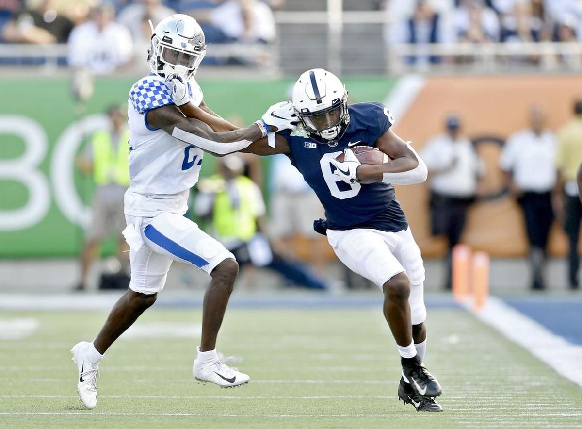 Penn State wide receiver Justin Shorter push away Kentucky cornerback Chris Westry during the Citrus bowl on Tuesday, Jan. 1, 2019 at Camping World Stadium.