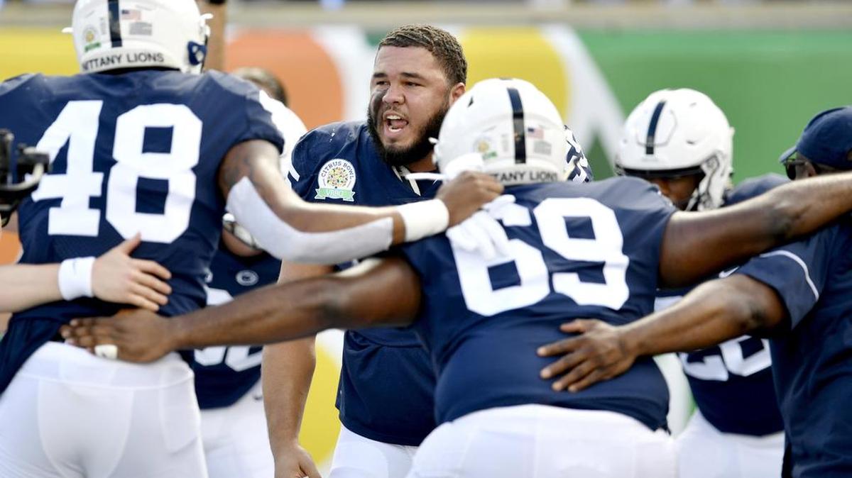Penn State defensive tackle Antonio Shelton pumps up the defense for the game against Kentucky in the Citrus Bowl at Camping World Stadium on Tuesday, Jan. 1, 2019.
