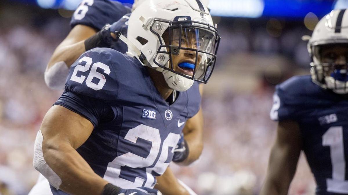 Penn State running back Saquon Barkley celebrates his touchdown during the Big Ten Championship game.