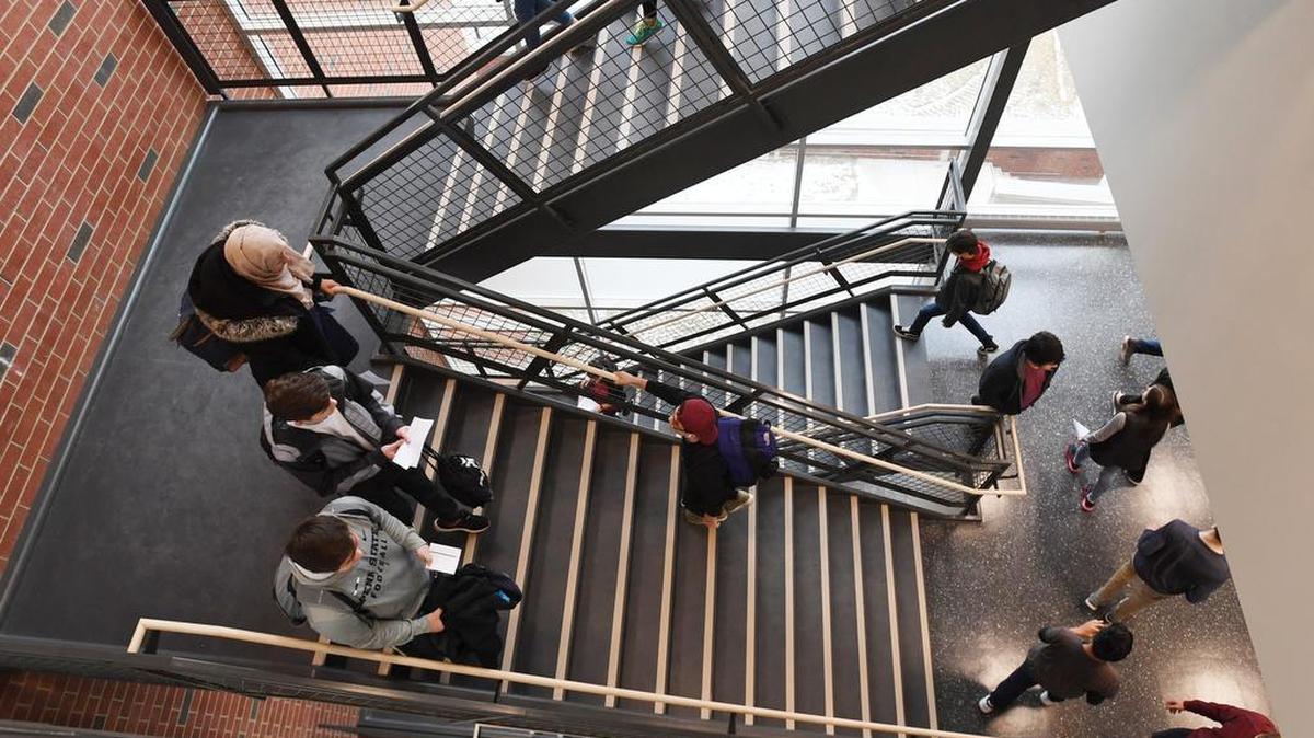Students walk the halls of the new State College High School building on Jan. 8.
