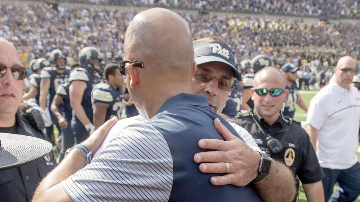 Pitt coach Pat Narduzzi and Penn State coach James Franklin talk after the Saturday, September 10, 2016 game at Heinz Field. Pitt won, 42-39.