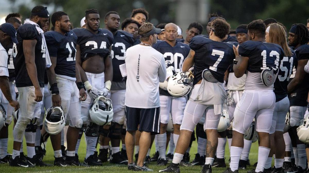 Penn State defensive coordinator Brent Pry talks to his players after practice on Wednesday, August 8, 2018.  