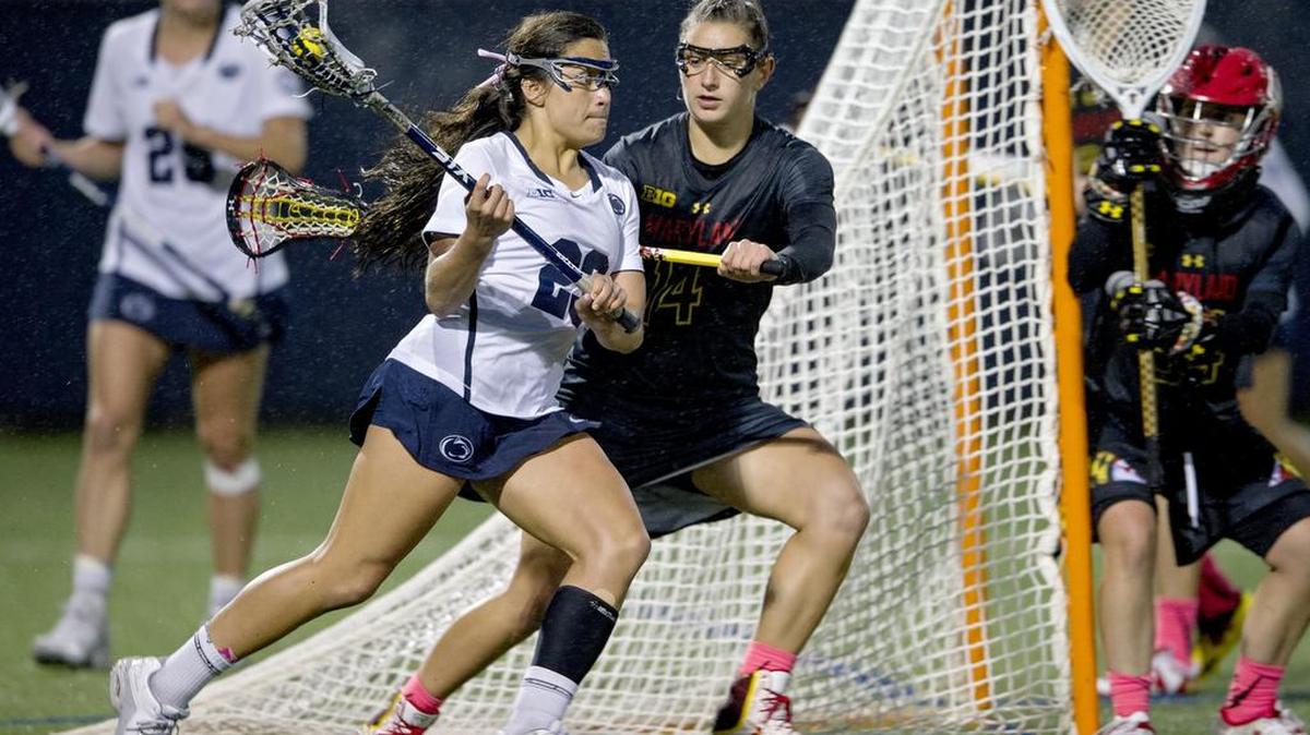 Penn State's Steph Lazo runs around Maryland's Nadine Hadnagy during the Thursday, April 28, 2016 game.