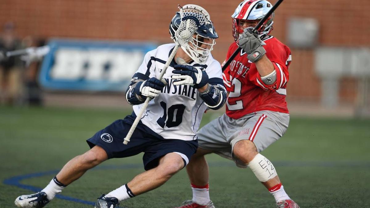 Penn State attack Nick Aponte runs around Ohio State defense Matt Borges during a game earlier this season. The Nittany Lions beat Michigan 17-13 on Sunday after Aponte scored five goals and four assists.