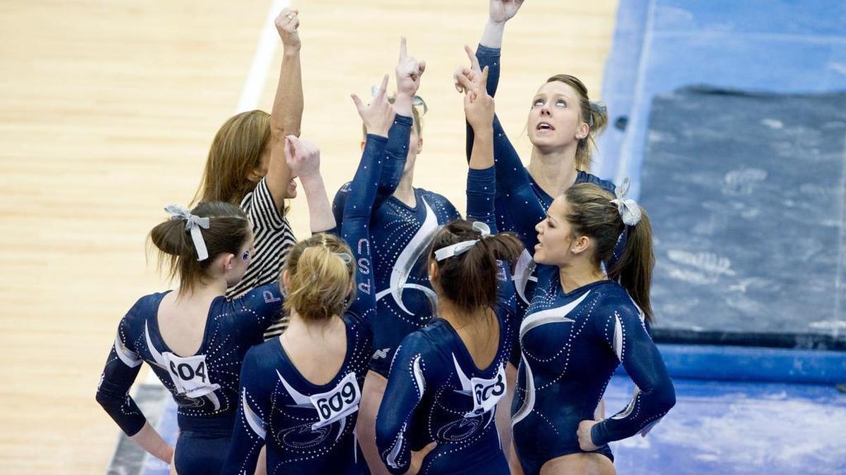Penn State gymnasts prep for the beam during the 2014 NCAA Women’s Regional Championships 2014. Rachelle Thompson, the women’s gymnastics team’s associate head coach, resigned amid allegations of emotional abuse.