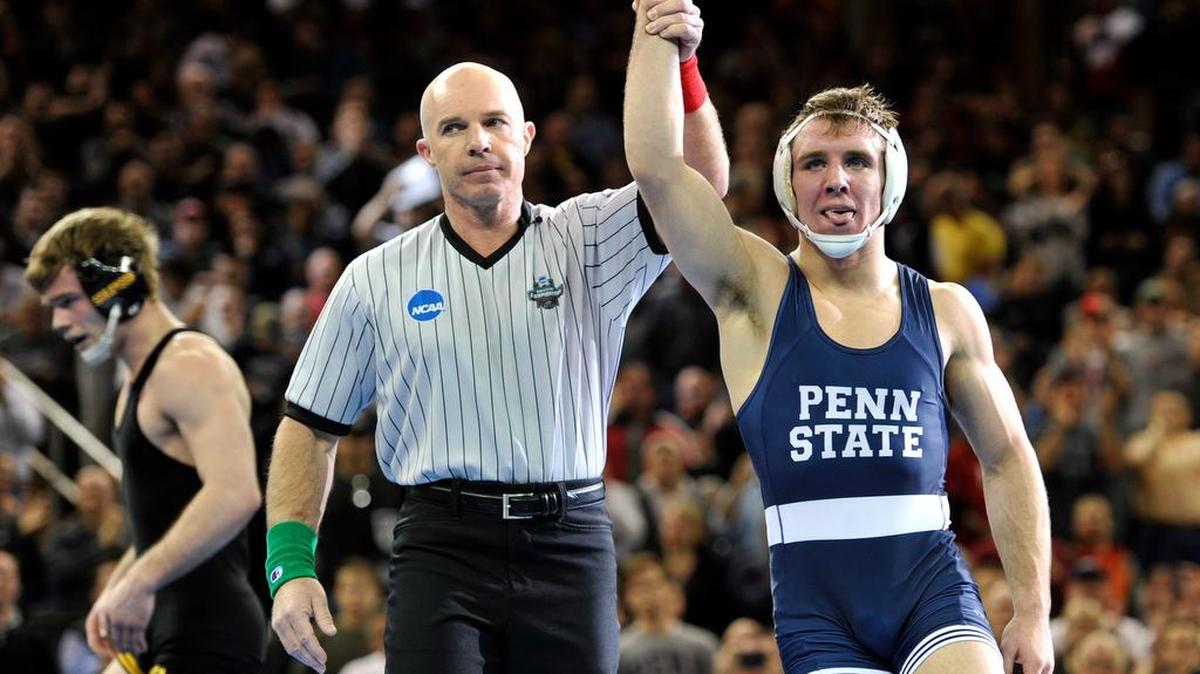 Penn State’s Zain Rutherford, right, beats Iowa’s Brandon Sorensen for the 149-pound title at the NCAA Championships in New York in March. Retherford was named Penn State’s Male Athlete of the Year on Tuesday.