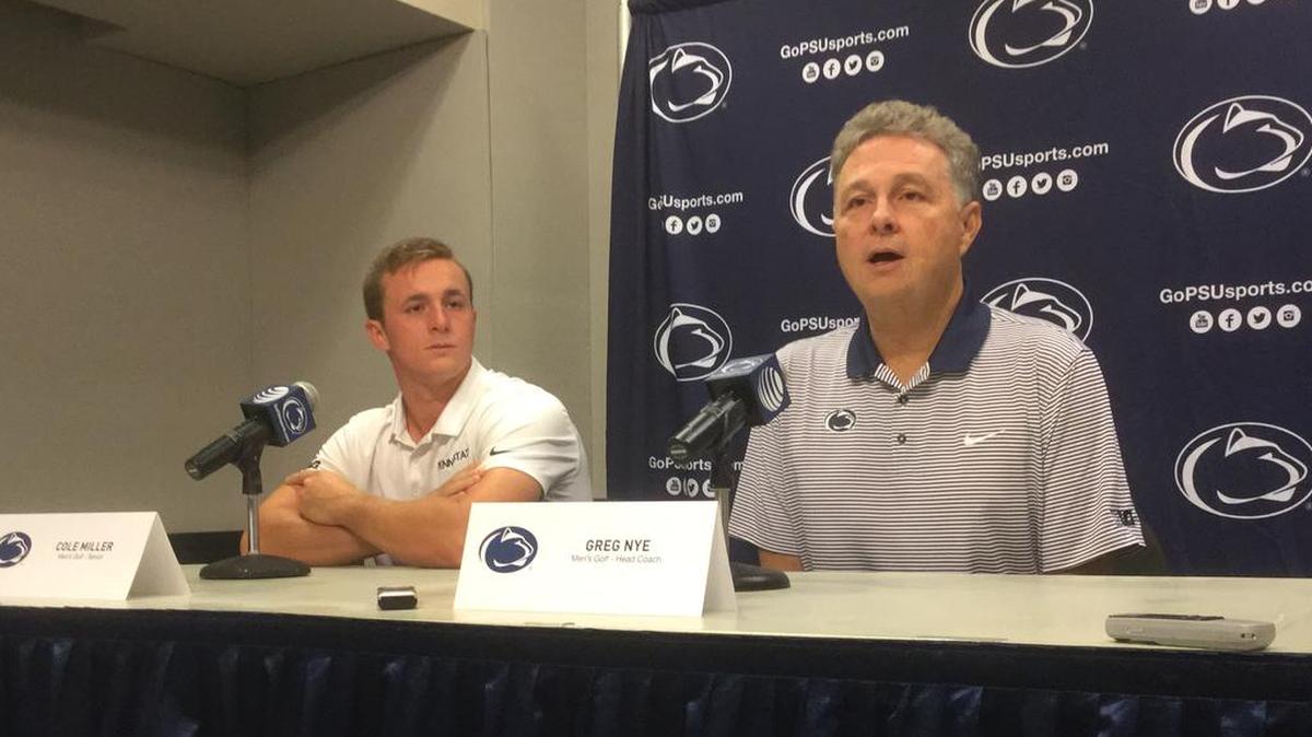 Penn State head golf coach Greg Nye, right, discusses the Nittany Lions’ upcoming season in August 2017. The longtime coach announced his retirement on Tuesday.
