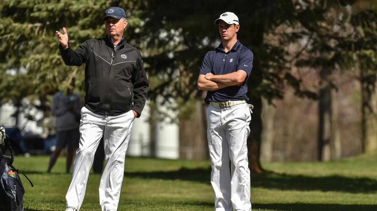 Penn State coach Greg Nye talks things over with Christian Elliott during a past Rutherford Intercollegiate. Nye and the Nittany Lions overcame a 12-stroke deficit Sunday to earn the tournament co-championship with Georgetown.