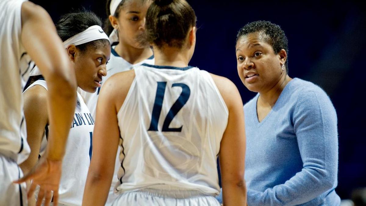 Penn State women’s basketball coach Coquese Washington, right, guided the Lady Lions to a 12-19 season.