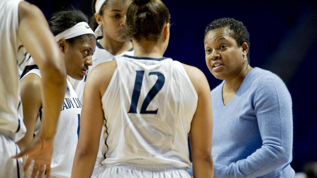 Penn State Lady Lions coach Coquese Washington talks to her players during the Thursday, December 3, 2015 women's basketball game against Virginia Tech at the Bryce Jordan Center. Virginia Tech won, 64-59.