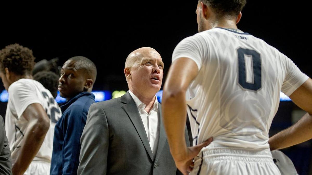 Penn State basketball coach Patrick Chambers talks to Payton Banks during a timeout of the Tuesday, November 17, 2015, game at the Bryce Jordan Center. Penn State won, 68-62.