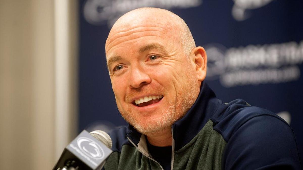 Penn State coach Patrick Chambers talks with reporters during mens' basketball media day on Tuesday, Oct. 14, 2014.