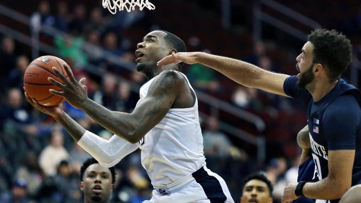 Pittsburgh's Michael Young (2) takes a shot past Penn State's Payton Banks (0) during the second half of an NCAA college basketball game Saturday, Dec. 10, 2016, in Newark, N.J. Pittsburgh won 81-73.