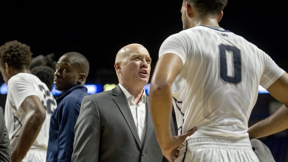 Penn State basketball coach Patrick Chambers talks to Payton Banks during a timeout of the Tuesday, November 17, 2015 game at the Bryce Jordan Center. Penn State won, 68-62.