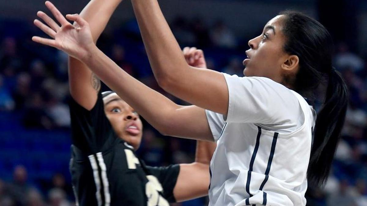 Penn State’s Peyton Whitted goes in for a basket around Purdue defender during the Saturday, February 11, 2017 game at the Bryce Jordan Center.