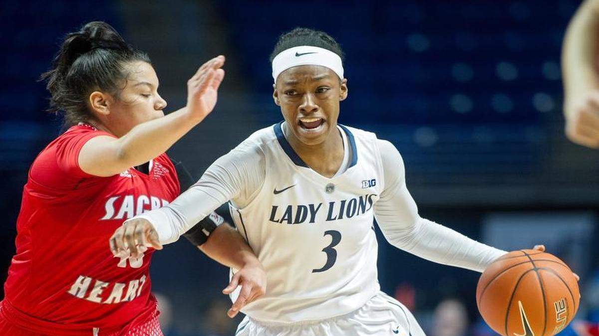 Penn State’s Brianna Banks dribbles around a Sacred Heart defender during the Sunday game.