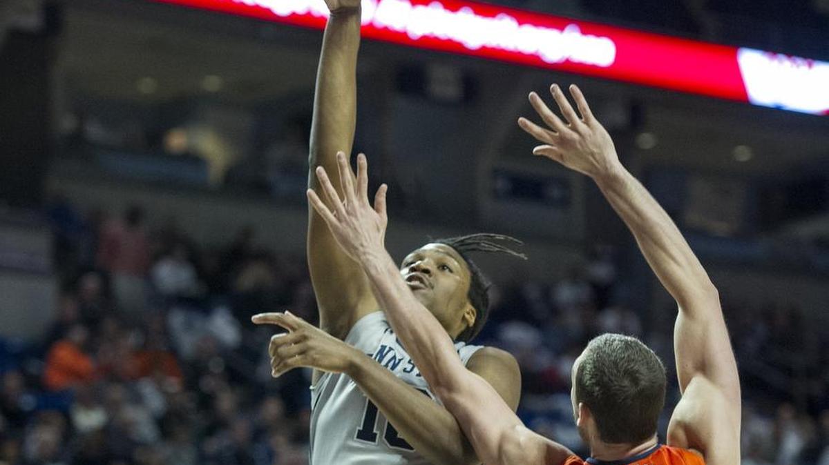 Penn State forward Brandon Taylor jumps for a shot over Illinois center Maverick Morgan (22) during the Nittany Lions’ 86-79 double-overtime win on Sunday at the Bryce Jordan Center.