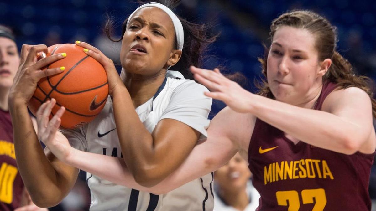 Lady Lions’ Kaliyah Mitchell and Minnesota’s Joanna Hedstrom (22) fight for the ball during the Wednesday, February 8, 2017 game at the Bryce Jordan Center. Penn State won, 77-66.