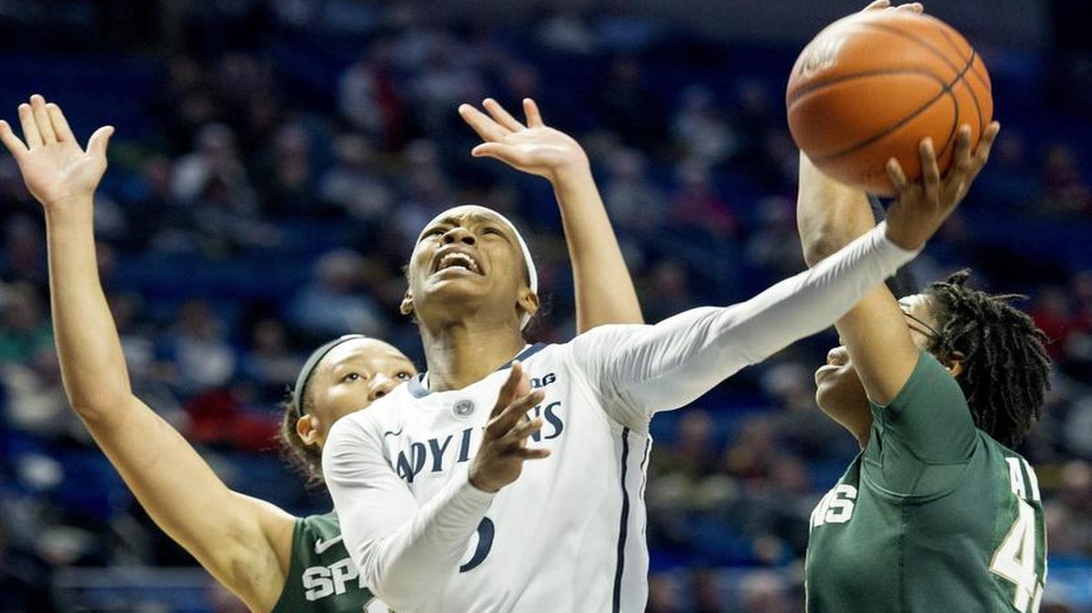 Penn State’s Brianna Banks goes in for a basket between Michigan State defenders during the Thursday, January 7, 2016, game at the Bryce Jordan Center. Michigan State won, 71-55. The Lady Lions are preparing for a rematch against the Spartans on Thursday.